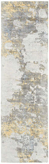 Close-up of Nourison Safari Dreams Ivory Gold Painterly rug. Abstract chestnut, gray, and gold design.
