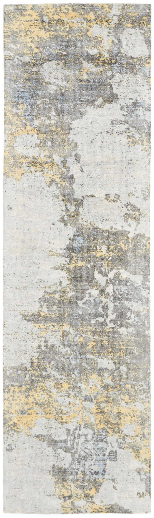 Close-up of Nourison Safari Dreams Ivory Gold Painterly rug. Abstract chestnut, gray, and gold design.