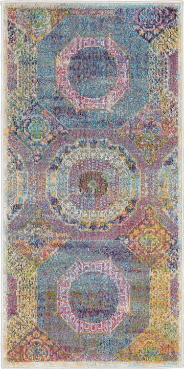 Close-up of the Nourison Ankara Global Multicolor Bohemian Area Rug, featuring geometric patterns and vibrant color blends.