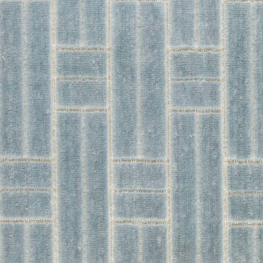 Close-up of Nourison Charm Blue Ivory rug. Modern geometric design with vertical and horizontal lines. Soft texture.