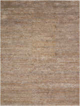 Close-up of the Calvin Klein Mesa Amber rug, showing its textured, mustard-toned, mid-century modern design.