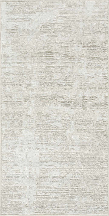 Close-up of the beige Nourison Dekor rug. High pile, machine-made rug with a subtle, textured mid-century modern design.