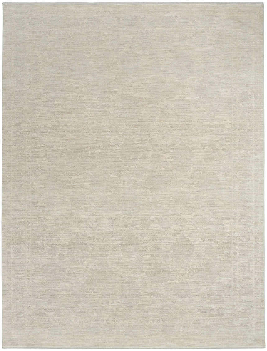 Close-up of the Nourison Shadows Ivory Grey Vintage Indoor Area Rug with a subtle, distressed pattern and soft texture.