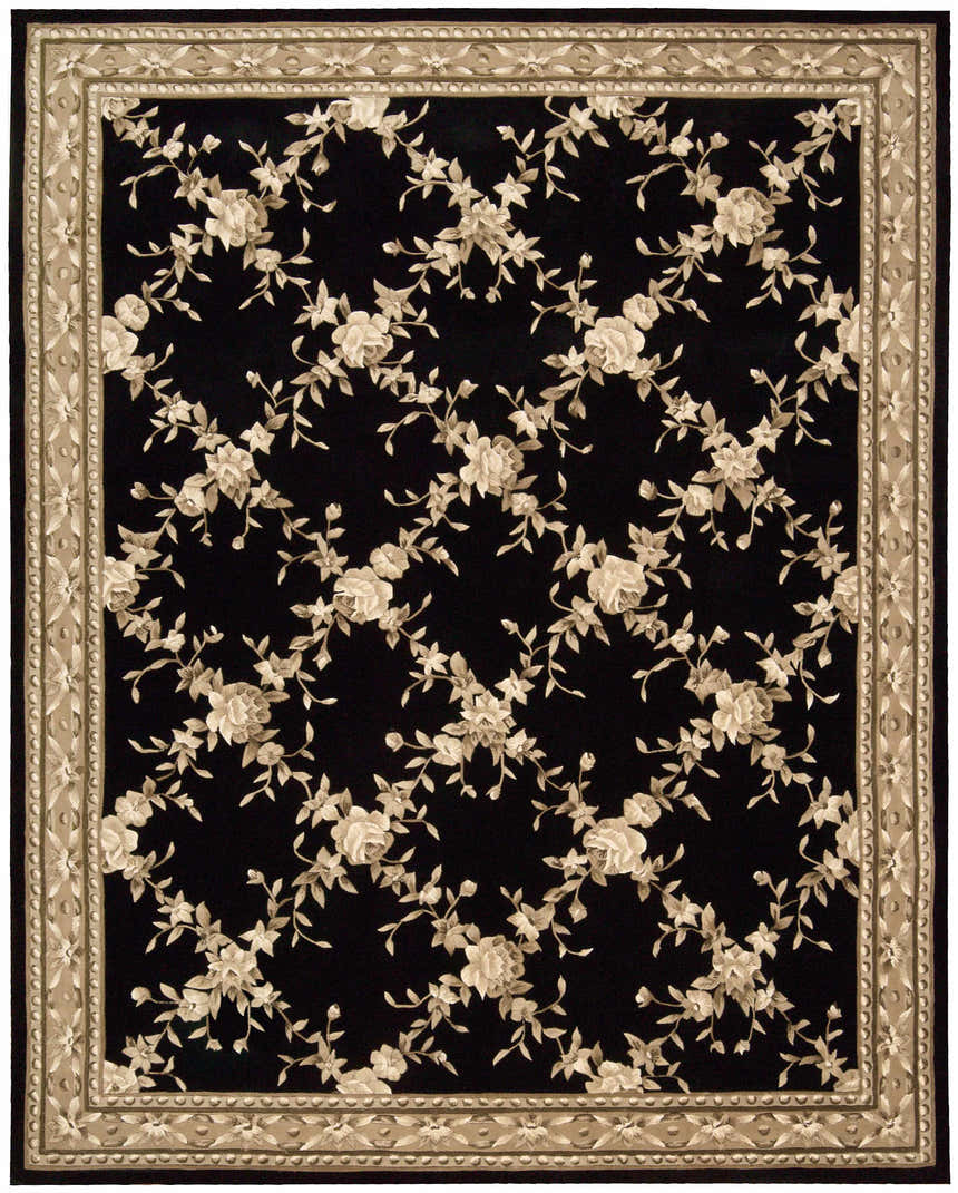 Close-up of the Nourison Julian Black Area Rug, featuring a floral pattern and a tan border.