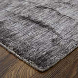 Close-up of Feizy Marlowe Gray/Taupe Area Rug showing texture and chevron pattern. Corner