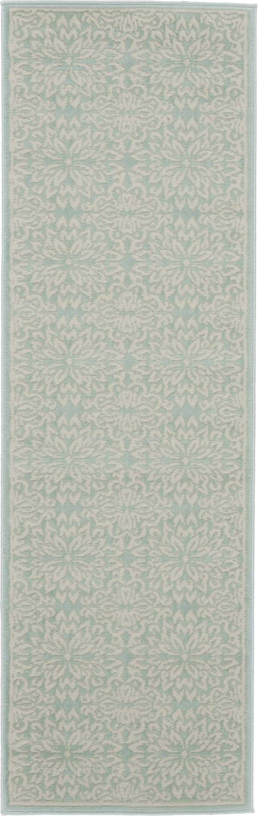 Close-up of Nourison Jubilant Ivory Green rug. Farmhouse style rug with floral pattern in ivory and light green.