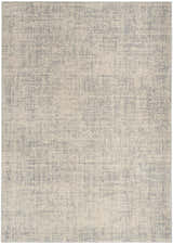 Close-up of the Calvin Klein CK030 Currents rug. Beige and gray modern design with a subtle, textured pattern.