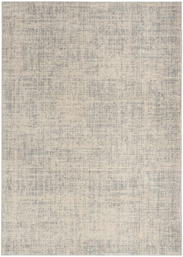 Close-up of the Calvin Klein CK030 Currents rug. Beige and gray modern design with a subtle, textured pattern.