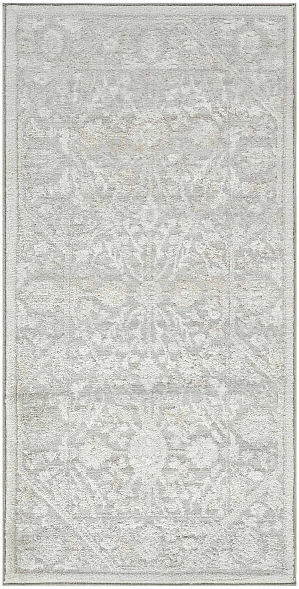 Close up of the grey vintage pattern and high pile texture of the Nourison Dekor Area Rug.