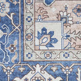 Close-up of the Nourison Fulton Navy Ivory Vintage Area Rug, showcasing its floral and geometric pattern.