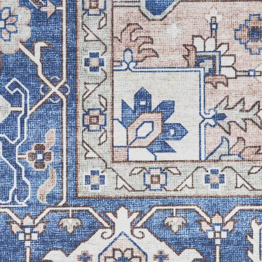Close-up of the Nourison Fulton Navy Ivory Vintage Area Rug, showcasing its floral and geometric pattern.