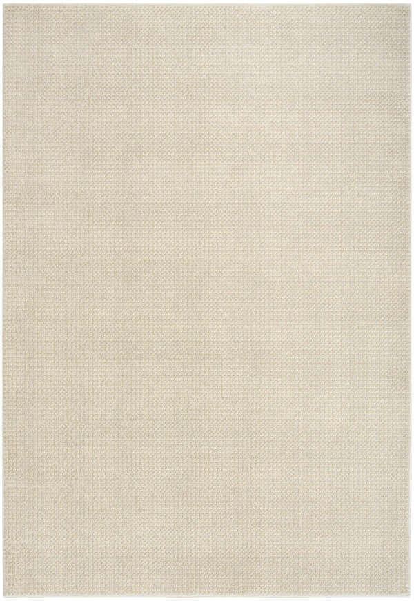 Close-up of the DKNY Atlantic Avenue beige rug. High pile texture with a subtle, modern pattern.