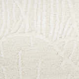 Close-up of the ivory Nourison Avra rug. Shows texture and subtle geometric pattern. Handmade wool rug.