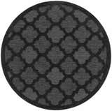 Close-up of a round Nourison Easy Care Charcoal Black rug with a taupe quatrefoil pattern.