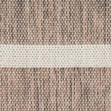 Close-up of the Nourison Positano Natural Ivory rug, showing chestnut brown woven texture with a horizontal ivory stripe.