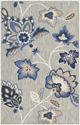 Close-up of Nourison Aloha Blue Grey Outdoor Area Rug with a floral pattern in blue, gray, and beige.