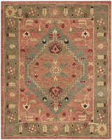 Detailed Nourison Tahoe Rust area rug. Traditional floral and geometric pattern in rust, green, and beige wool.