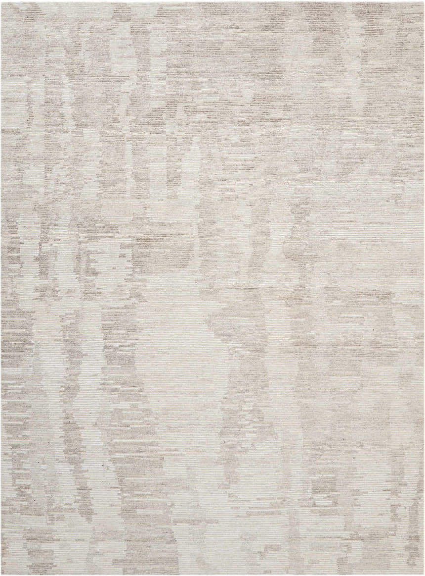 Close up of the Nourison Ellora Ivory Grey rug showing the subtle mid-century modern pattern and texture.