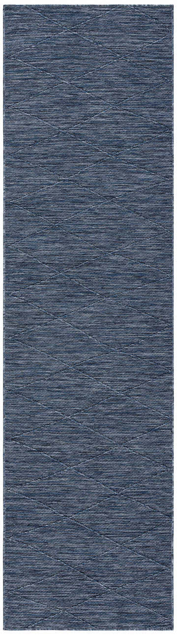 Close-up of the Nourison Solutions Navy Blue Modern Washable Area Rug, showing texture and subtle diamond pattern.