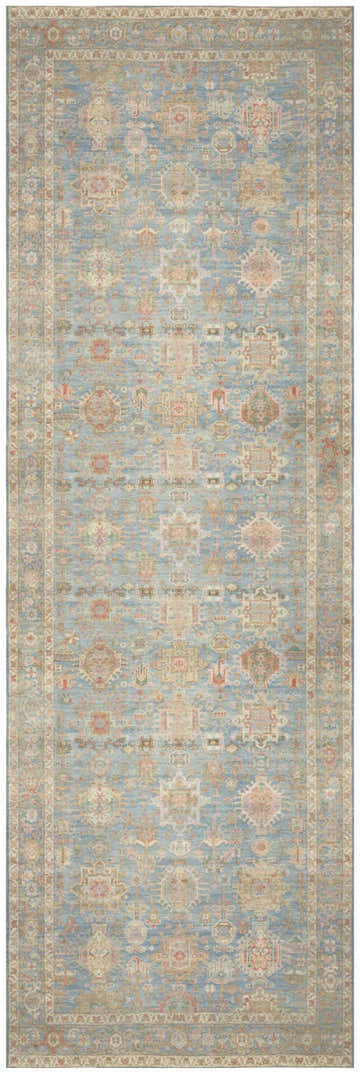 Close-up of the Nourison Vintage Navy Multicolor rug, showing its vintage-inspired pattern and soft, washable texture.