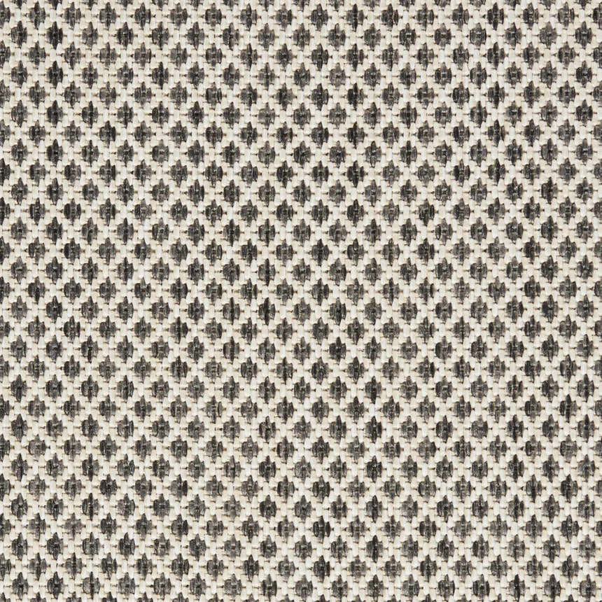 Close-up of Nourison Courtyard Ivory Charcoal rug showing the diamond pattern and textured weave.