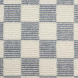 Close-up of Nourison Serenity Home Ivory Blue Rug. High pile rug with a modern checkered pattern and textured design.