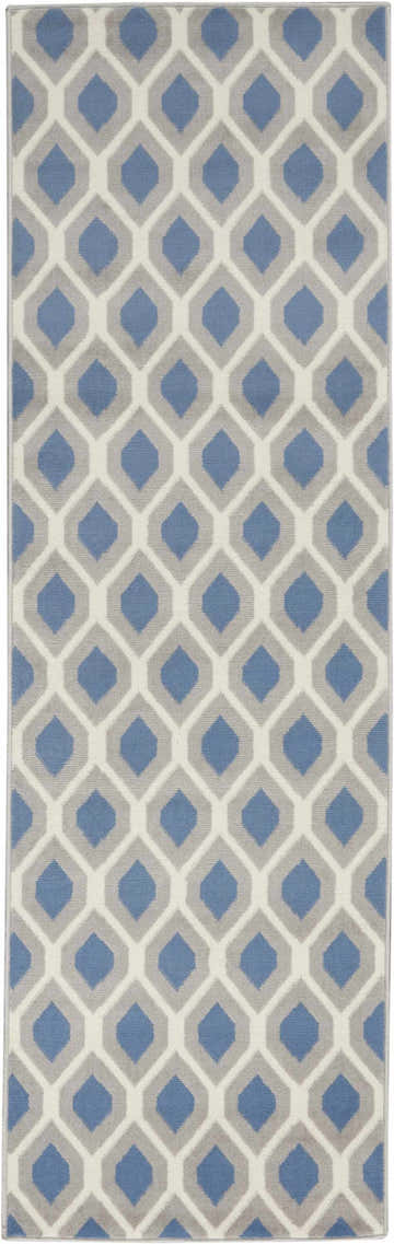 Close-up of Nourison Grafix Blue rug featuring a geometric diamond pattern in light blue, gray, and ivory.