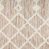 Close-up of the Nourison Positano Beige Area Rug showing its woven texture and subtle geometric pattern.