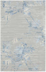 Close-up of the Calvin Klein CK005 Enchanting Grey Sky rug. Abstract blue and ivory pattern on a textured gray high pile.