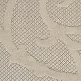 Close-up of the cream Nourison Cozumel rug. Farmhouse style rug with a textured, geometric pattern.
