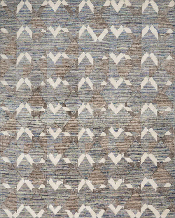 Close-up of Portfolio Catherine & Justine Macfee Ice Blue rug. Features geometric diamond pattern in blue, brown, and white.