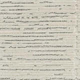 Close up of the high pile Nourison Ivory Hues Ivory Grey Area Rug, showing chestnut colored horizontal lines.