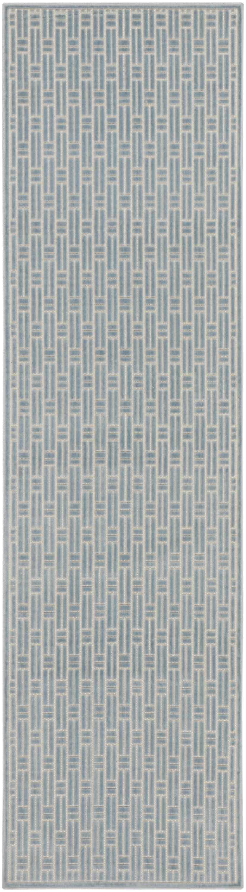 Close-up of Nourison Charm Blue Ivory rug featuring a modern geometric pattern of rectangles.
