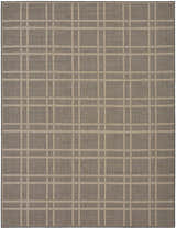 Close-up of Nourison Horizon Charcoal rug. Taupe plaid pattern on a charcoal background. Modern, indoor/outdoor rug.