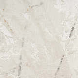 Close-up of the Nourison Desire Ivory Grey Blue rug, showing its subtle abstract pattern and soft, textured weave.