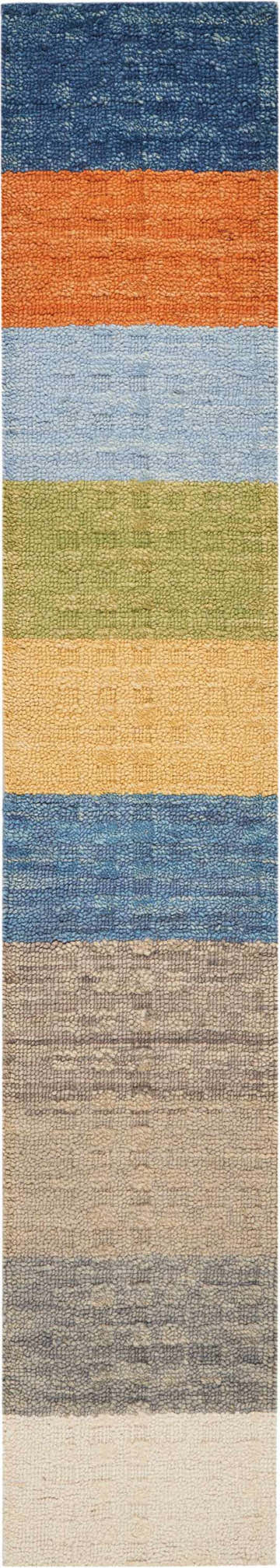 Close-up of the handmade Nourison Marana Blanket rug. Features blue, orange, green, yellow, and gray stripes. Wool and cotton texture.