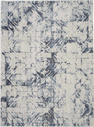 Close-up of the Nourison Urban Decor Ivory/Blue rug. Modern design with chestnut accents and a geometric pattern.