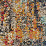 Close-up of the Nourison Celestial Multicolor rug, showing its abstract pattern and textured weave in shades of gold, red, blue and grey.