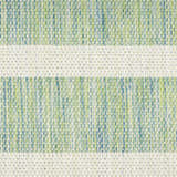 Close-up of the Nourison Positano Blue Green Ivory rug, showing the woven texture and striped pattern.