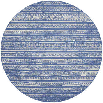 Round Nourison Whimsicle rug, light blue and ivory, with a distressed bohemian pattern. Clearance item.