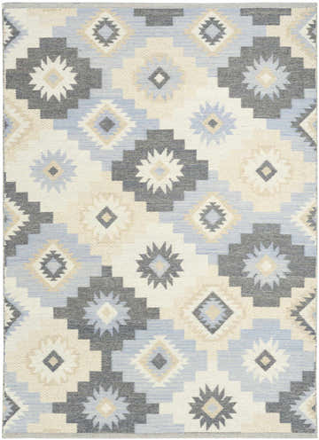 Close-up of Nourison Copenhagen Ivory Navy rug. Mid-century modern design with geometric shapes in ivory, navy, beige and gray.