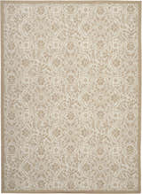 Close-up of the Nourison Aruba Beige Cream Area Rug, featuring a floral and geometric pattern in beige and cream.