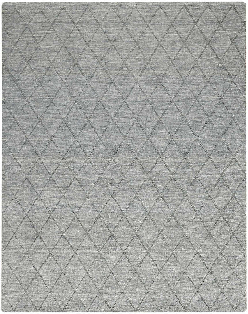 Close-up of the light blue Nourison Wool Haven rug, featuring a subtle diamond pattern and textured wool pile.