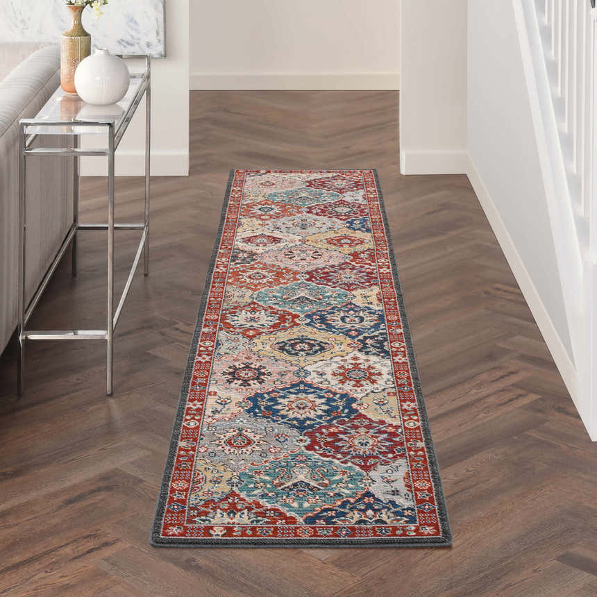 Hallway with Nourison Parisa Multicolor Traditional runner rug, wood floors, console table, and neutral decor.