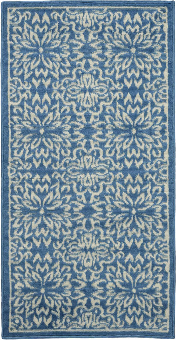 Close-up of Nourison Jubilant Ivory Blue Farmhouse Area Rug. Features a floral pattern in ivory on a blue background.