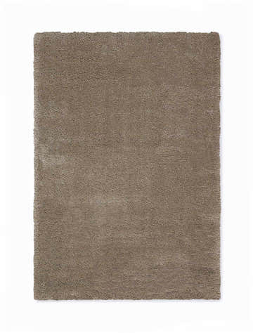 Close-up of the plush texture and silver gray color of the Calvin Klein Brooklyn area rug.