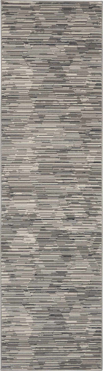 Close-up of Michael Amini MA90 Uptown Grey Ivory rug featuring a modern, linear pattern and soft, neutral tones.