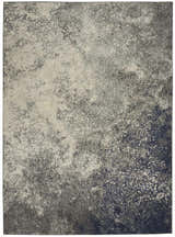 Close-up of the Nourison Passion Charcoal Ivory Rug, showing its abstract taupe and ivory pattern.