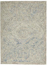 Close-up of the Nourison Interlock Blue Multicolor rug, showcasing its geometric pattern, texture, and wool construction.