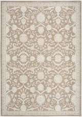 Close-up of the Nourison Isla Mocha Vintage Indoor Area Rug, featuring a light brown floral pattern and vintage style.